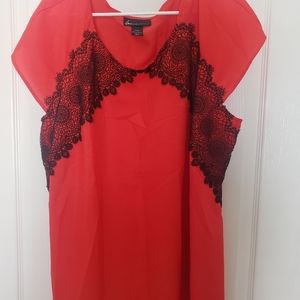 Red blouse with black lace